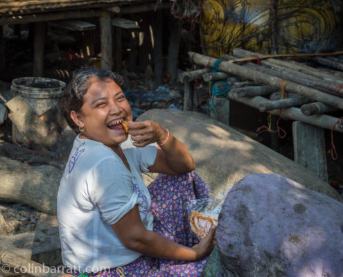 Having a snack, Dalah village, Myanmar